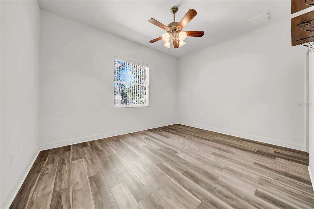 10177 Deer Street Spring Hill, FL 34608 - Photo 46 of 73 wooden floor in an empty room
