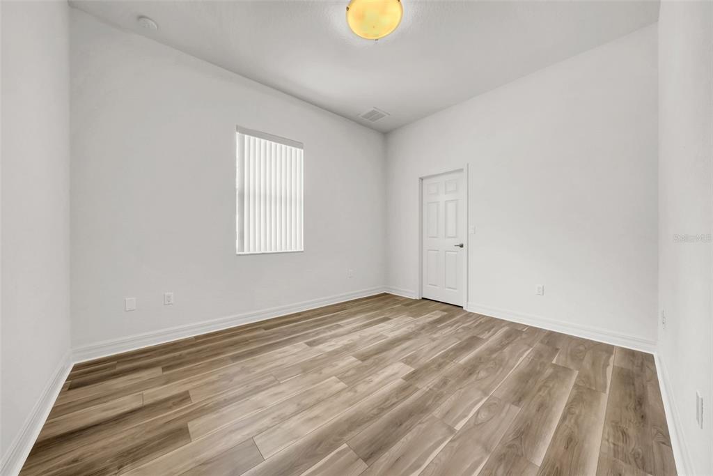 10177 Deer Street Spring Hill, FL 34608 - Photo 49 of 73 a view of empty room with window