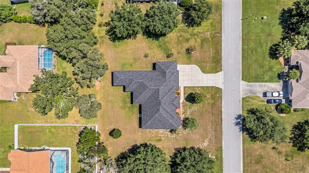 10177 Deer Street Spring Hill, FL 34608 - Photo 71 of 73 an aerial view of a house with a yard