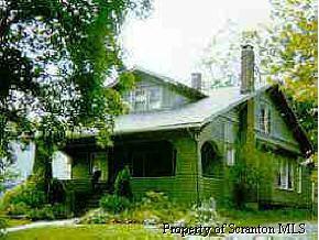 6 Harding Avenue Nicholson, PA 18446 - Photo 1 of 1 a front view of a house with garden