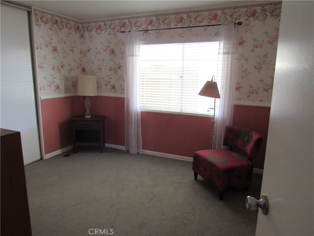27701 Murrieta Road, Unit 6 Menifee, CA 92586 - Photo 19 of 28 a room with furniture and a window