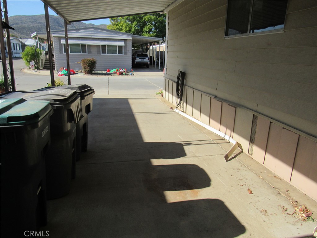 27701 Murrieta Road, Unit 6 Menifee, CA 92586 - Photo 27 of 28 a view of entryway and hall with wooden floor