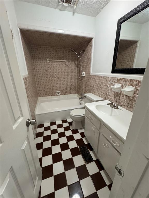 26 Plainview Drive Southwest Cartersville, GA 30120 - Photo 7 of 18 a bathroom with a sink a toilet and shower