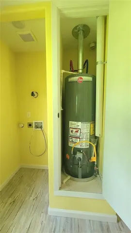 a bathroom with a granite countertop shower