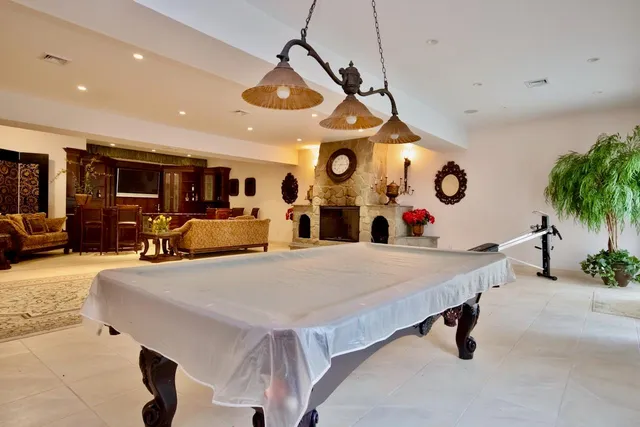 a very nice looking room with kitchen and furniture