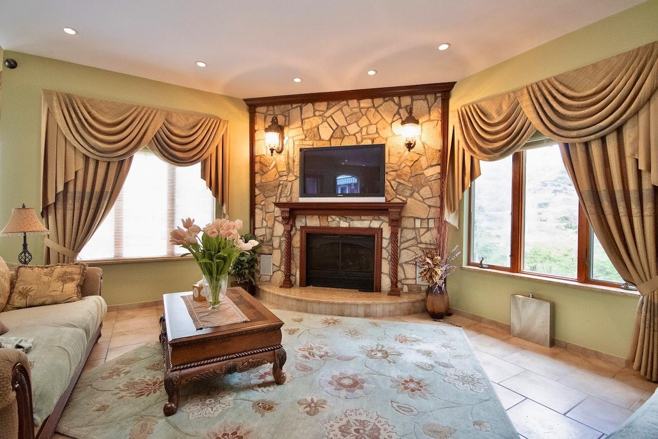 935 Starlight Road Monticello, NY 12701 - Photo 24 of 50 a living room with furniture and a fireplace