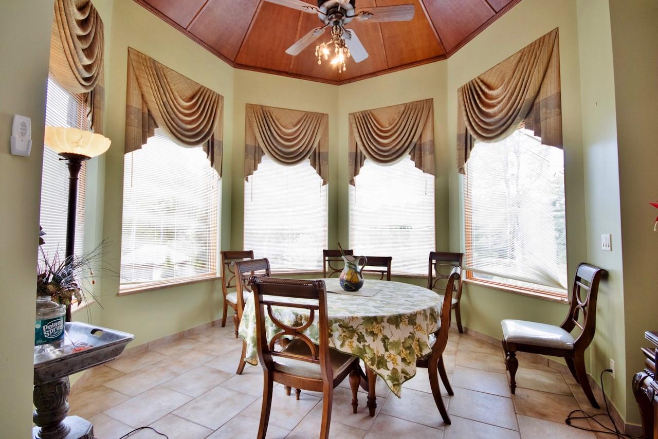935 Starlight Road Monticello, NY 12701 - Photo 25 of 50 a view of a table and chairs in a room