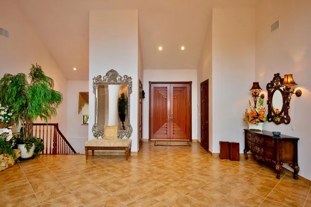 a view of a table and chairs in a room