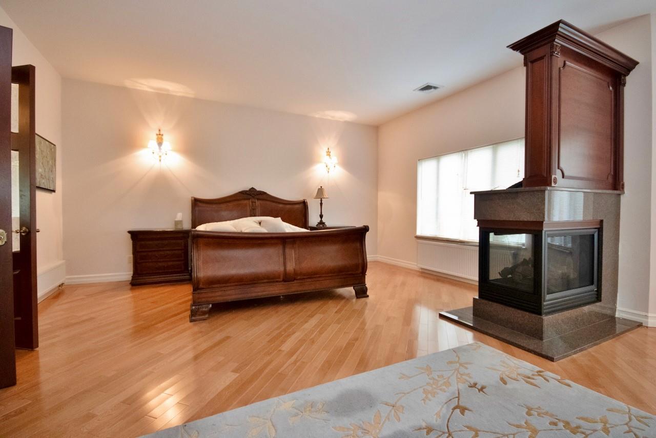 935 Starlight Road Monticello, NY 12701 - Photo 29 of 50 a bedroom with furniture and a mirror