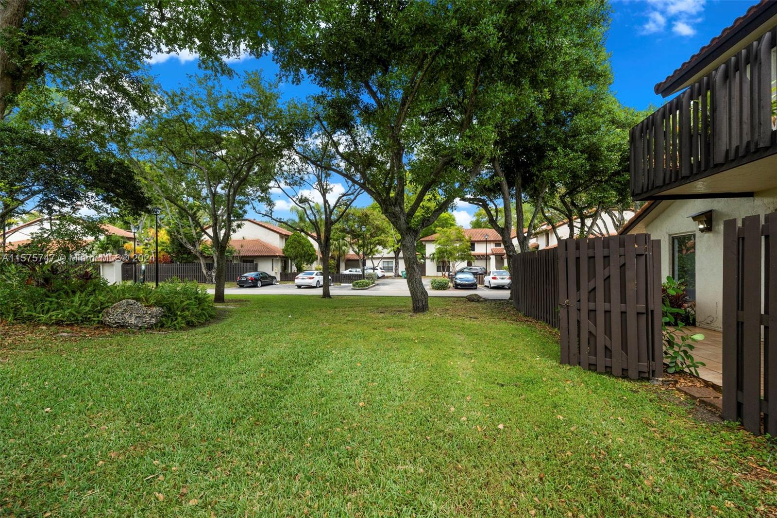 13298 Southwest 112th Terrace, Unit 461 Miami, FL 33186 - Photo 21 of 35 a view of outdoor space with garden and trees