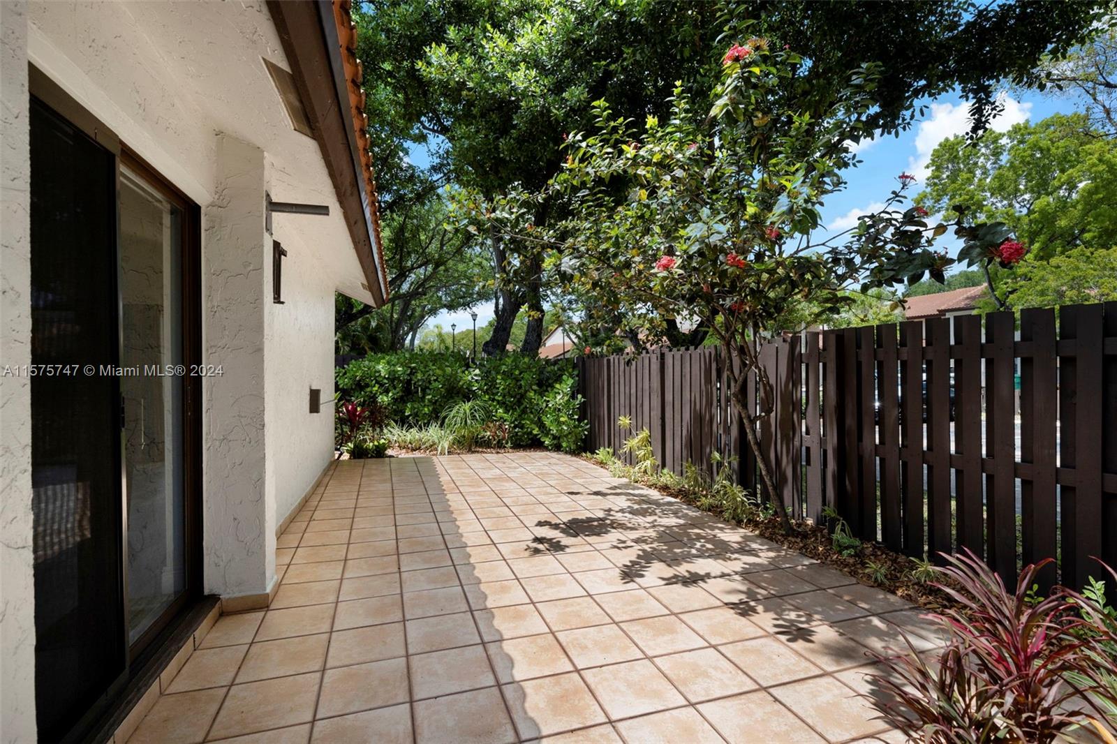 13298 Southwest 112th Terrace, Unit 461 Miami, FL 33186 - Photo 23 of 35 a view of a backyard
