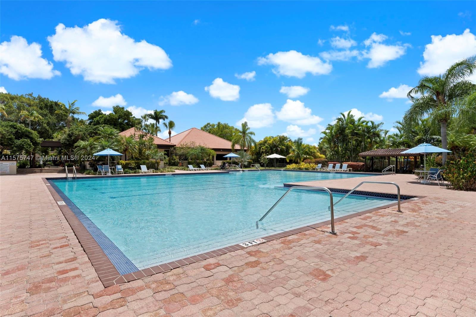 13298 Southwest 112th Terrace, Unit 461 Miami, FL 33186 - Photo 26 of 35 a view of an outdoor space and swimming pool