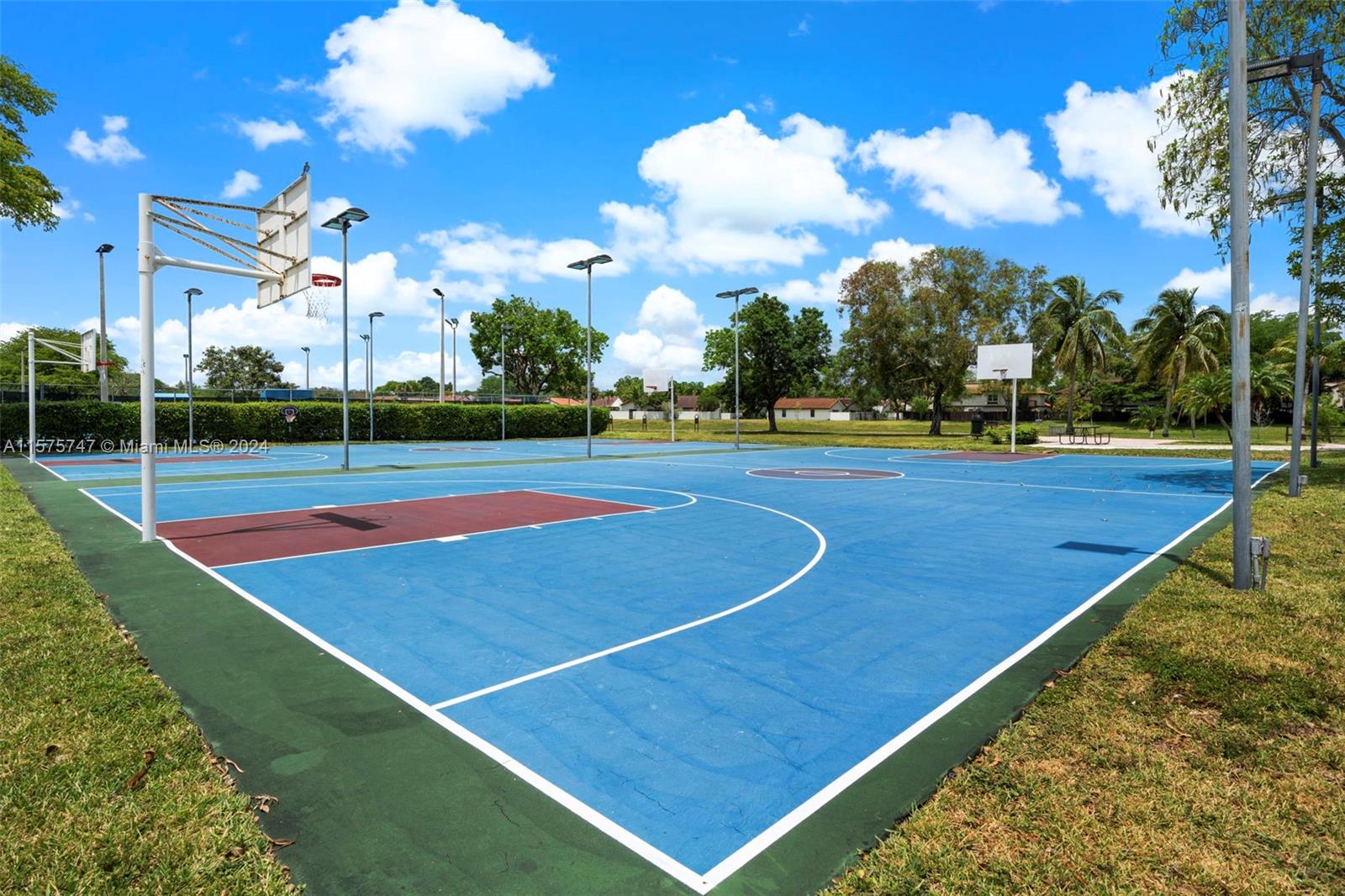 13298 Southwest 112th Terrace, Unit 461 Miami, FL 33186 - Photo 28 of 35 a view of a tennis court