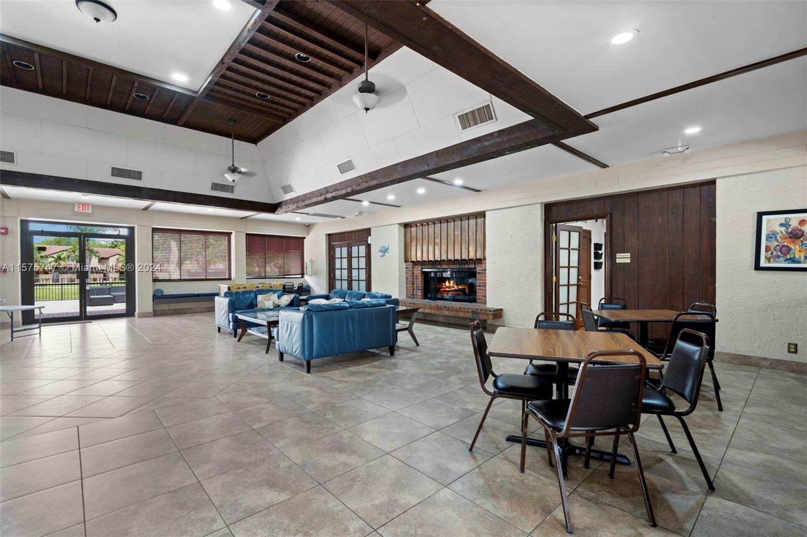 13298 Southwest 112th Terrace, Unit 461 Miami, FL 33186 - Photo 33 of 35 a view of a livingroom with furniture and window