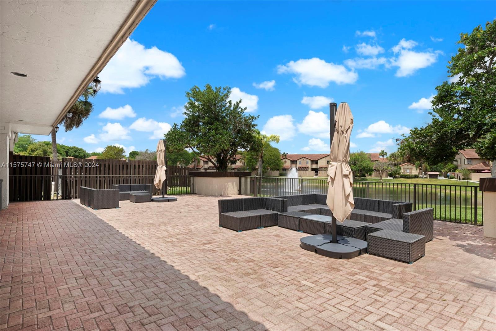 13298 Southwest 112th Terrace, Unit 461 Miami, FL 33186 - Photo 35 of 35 a view of a water fountain and a terrace