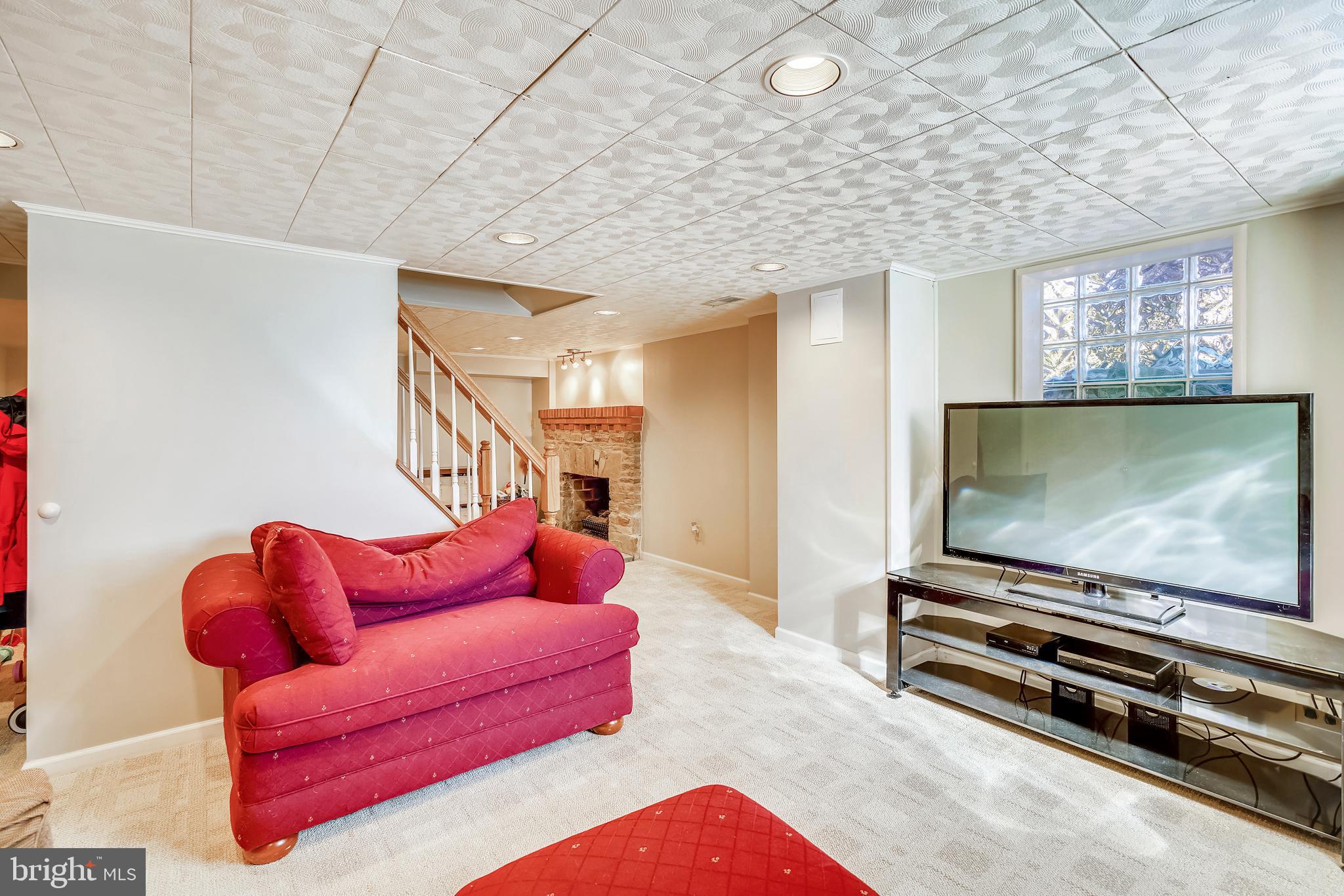 220 Homewood Road Linthicum Heights, MD 21090 - Photo 34 of 39 Basement rec room to watch games