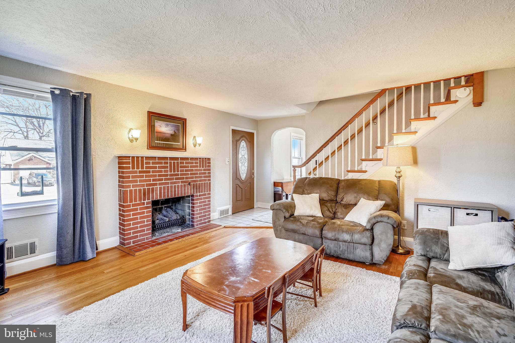 220 Homewood Road Linthicum Heights, MD 21090 - Photo 7 of 39 living room with gas fireplace