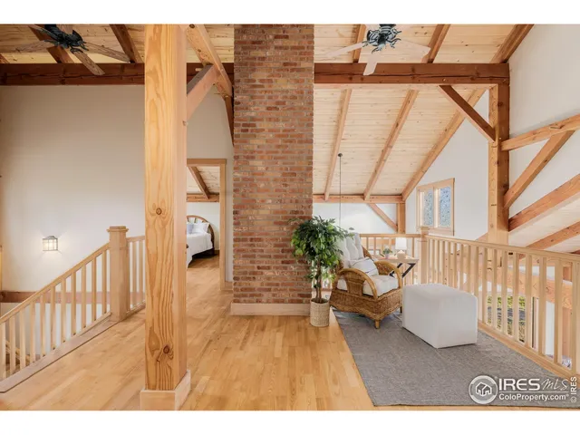 a view of a porch with wooden floor