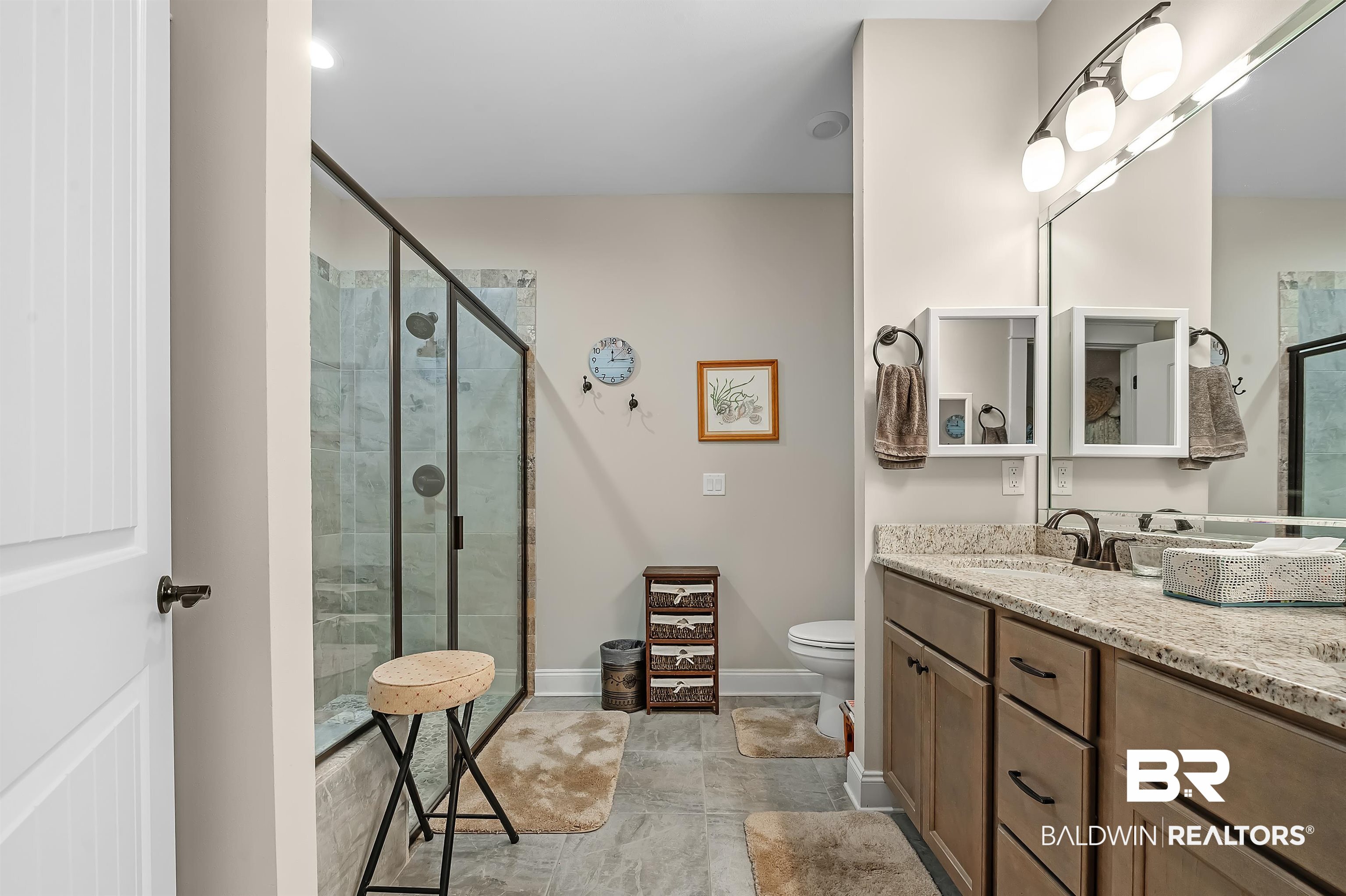 185 Mark Twain Loop Foley, AL 36535 - Photo 27 of 54 Bathroom with vanity, toilet, and an enclosed shower