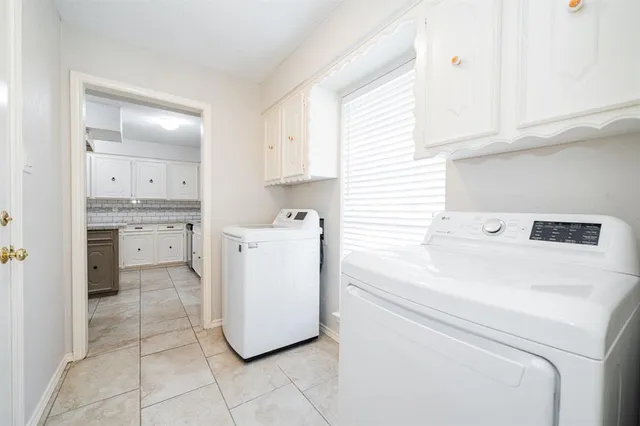 a bathroom with a sink toilet and vanity