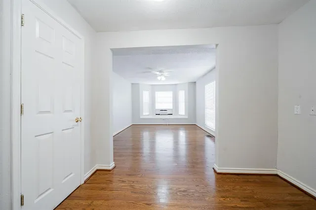 a view of an empty room and window