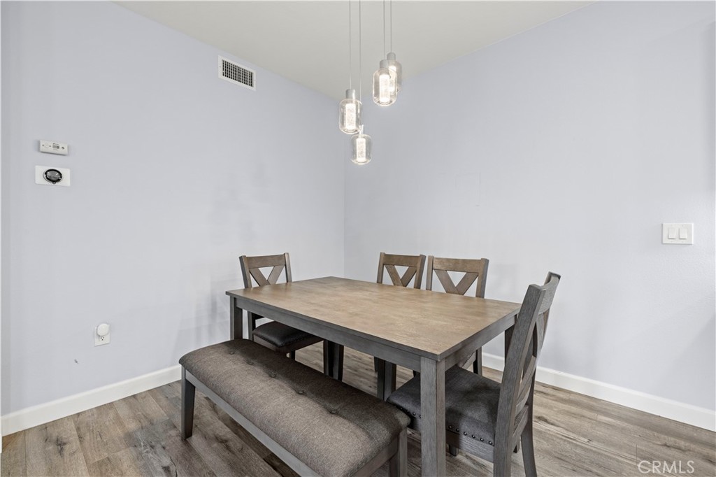 20000 Plum Canyon Road, Unit 1326 Saugus, CA 91350 - Photo 14 of 39 a view of a dining room with furniture