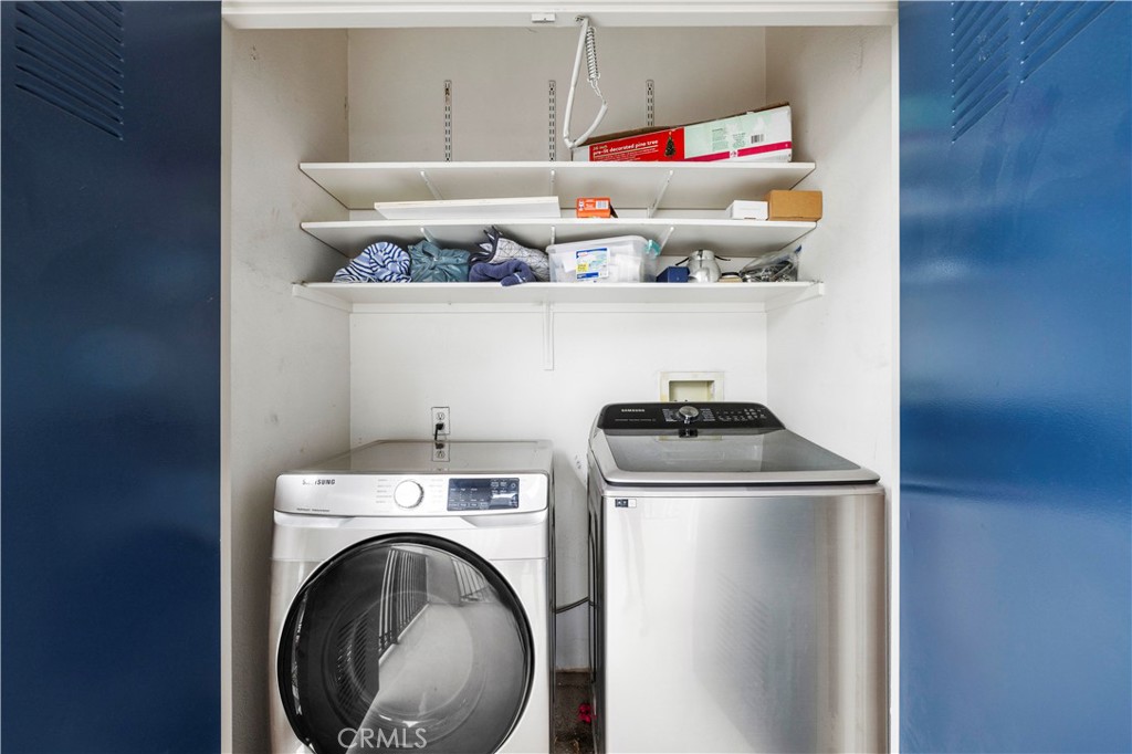 20000 Plum Canyon Road, Unit 1326 Saugus, CA 91350 - Photo 30 of 39 a utility room with dryer and washer