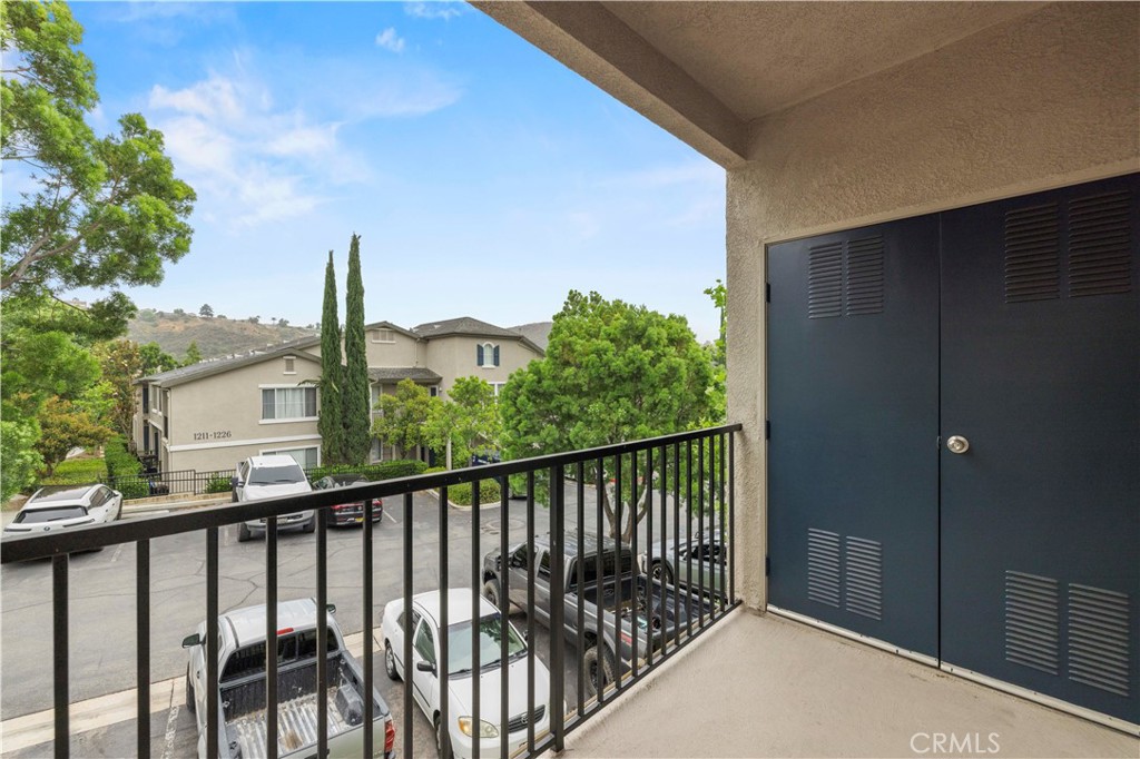 20000 Plum Canyon Road, Unit 1326 Saugus, CA 91350 - Photo 32 of 39 a view of a balcony with yard