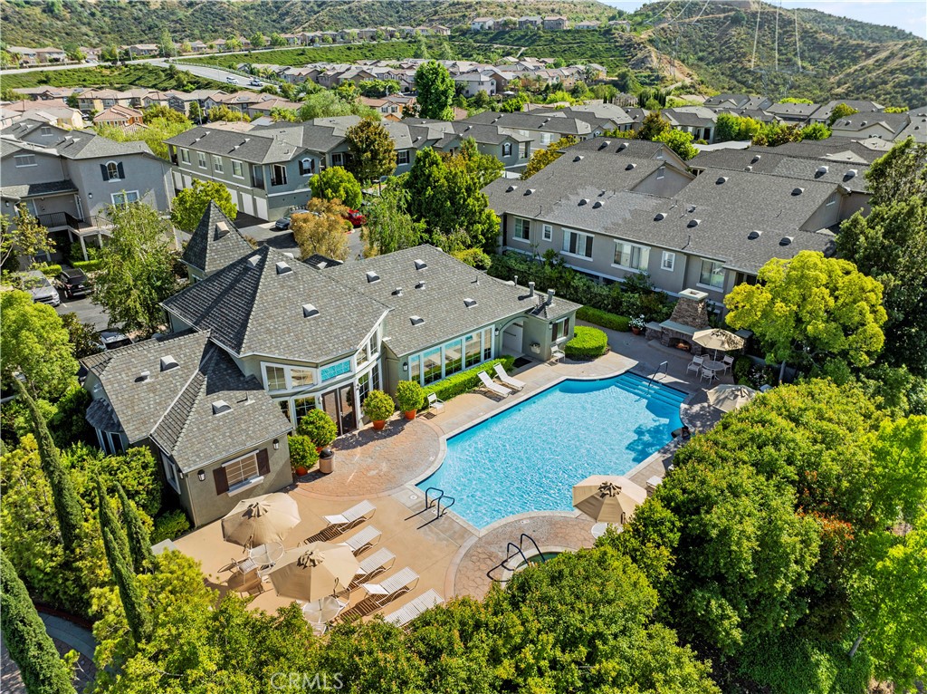20000 Plum Canyon Road, Unit 1326 Saugus, CA 91350 - Photo 38 of 39 an aerial view of multiple houses with yard