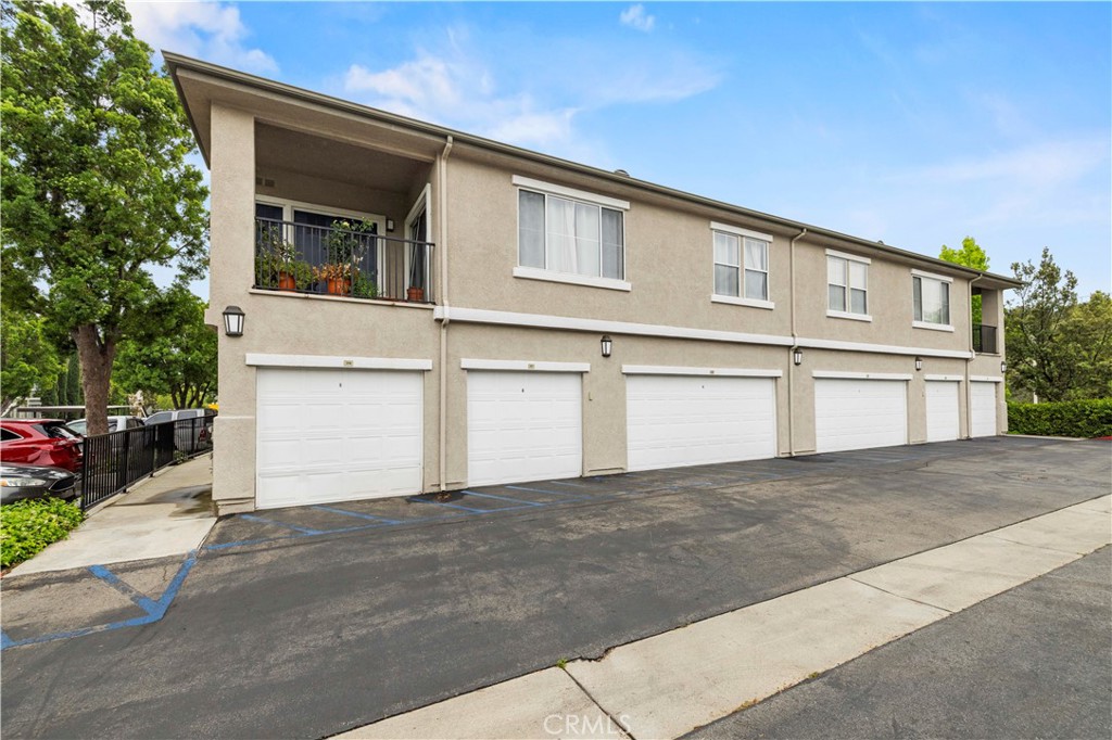 20000 Plum Canyon Road, Unit 1326 Saugus, CA 91350 - Photo 5 of 39 a view of a house with a street