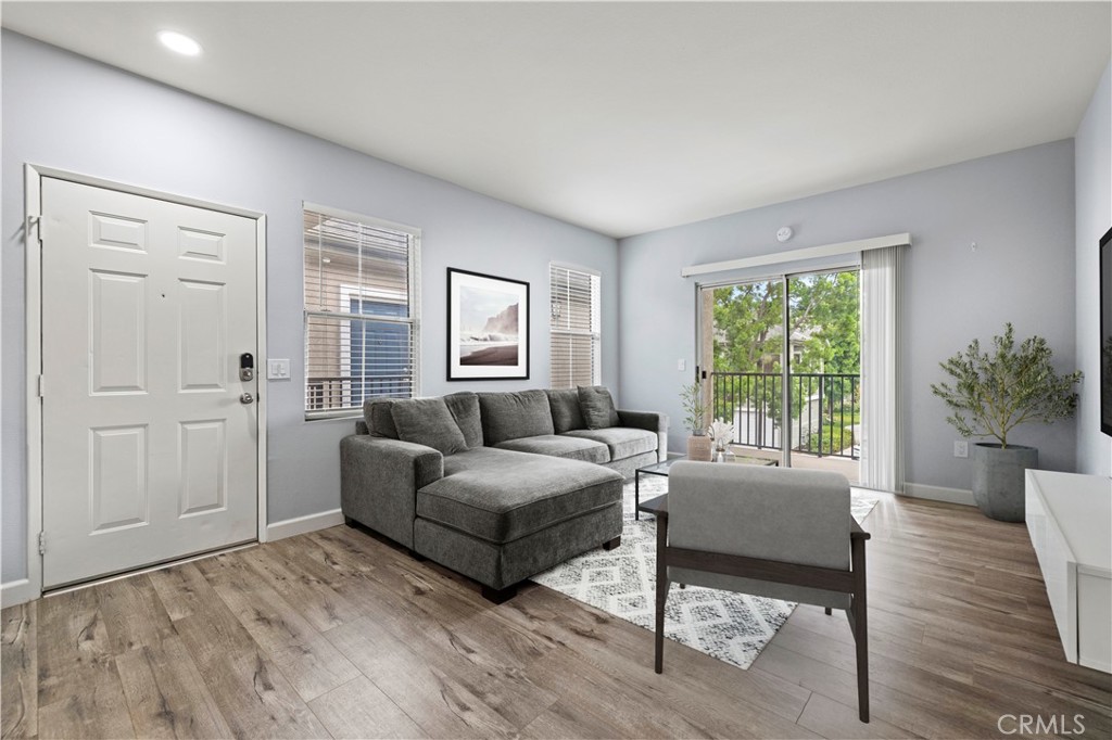 20000 Plum Canyon Road, Unit 1326 Saugus, CA 91350 - Photo 7 of 39 a living room with furniture and a window