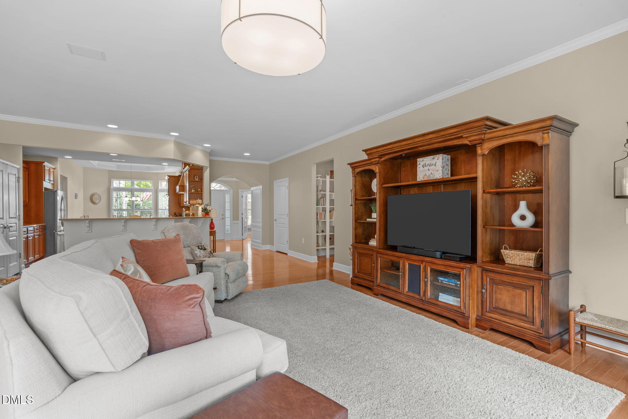 113 Beckingham Loop Cary, NC 27519 - Photo 11 of 57 a living room with furniture and a flat screen tv