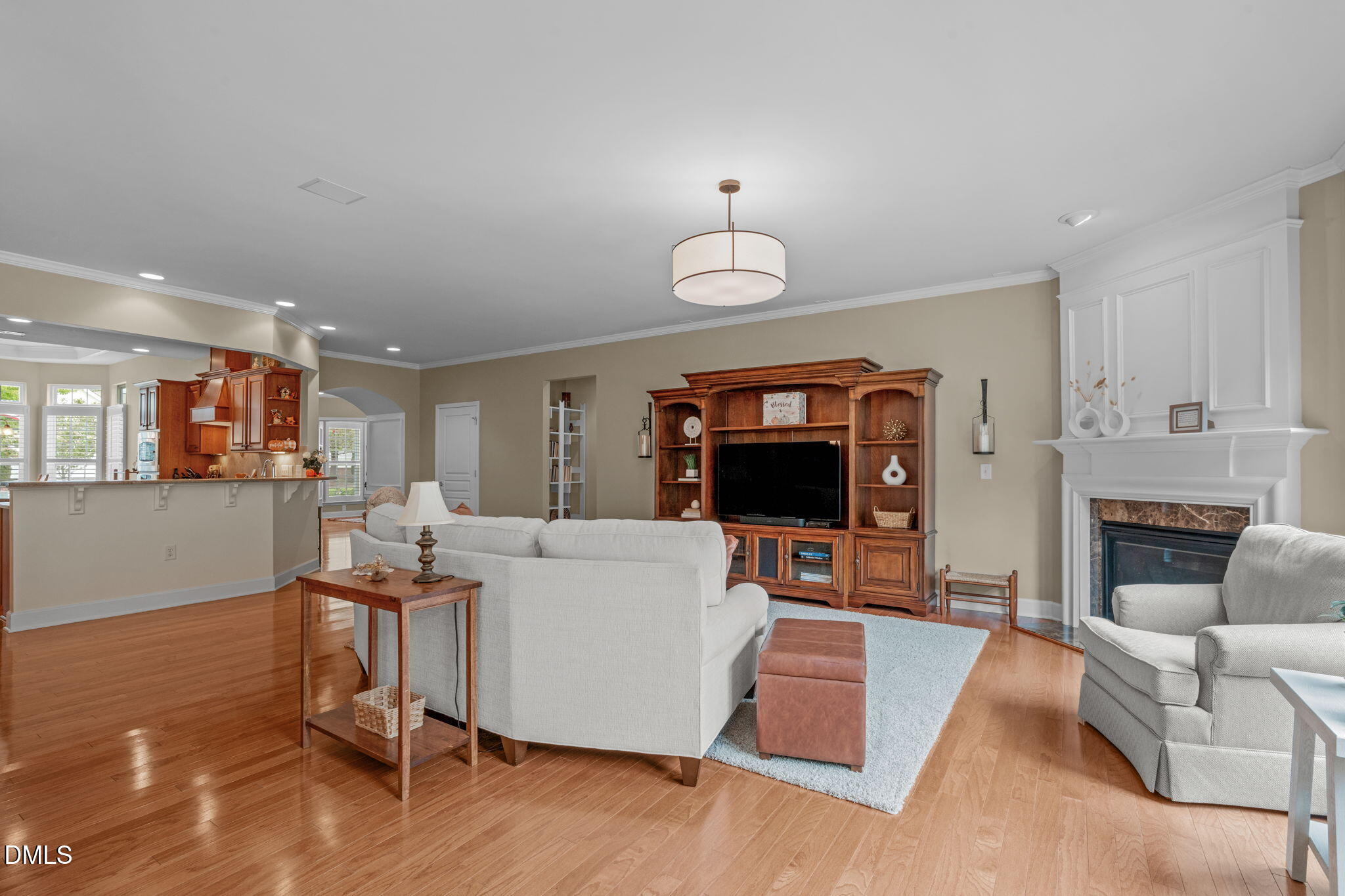 113 Beckingham Loop Cary, NC 27519 - Photo 13 of 57 a living room with furniture and a flat screen tv