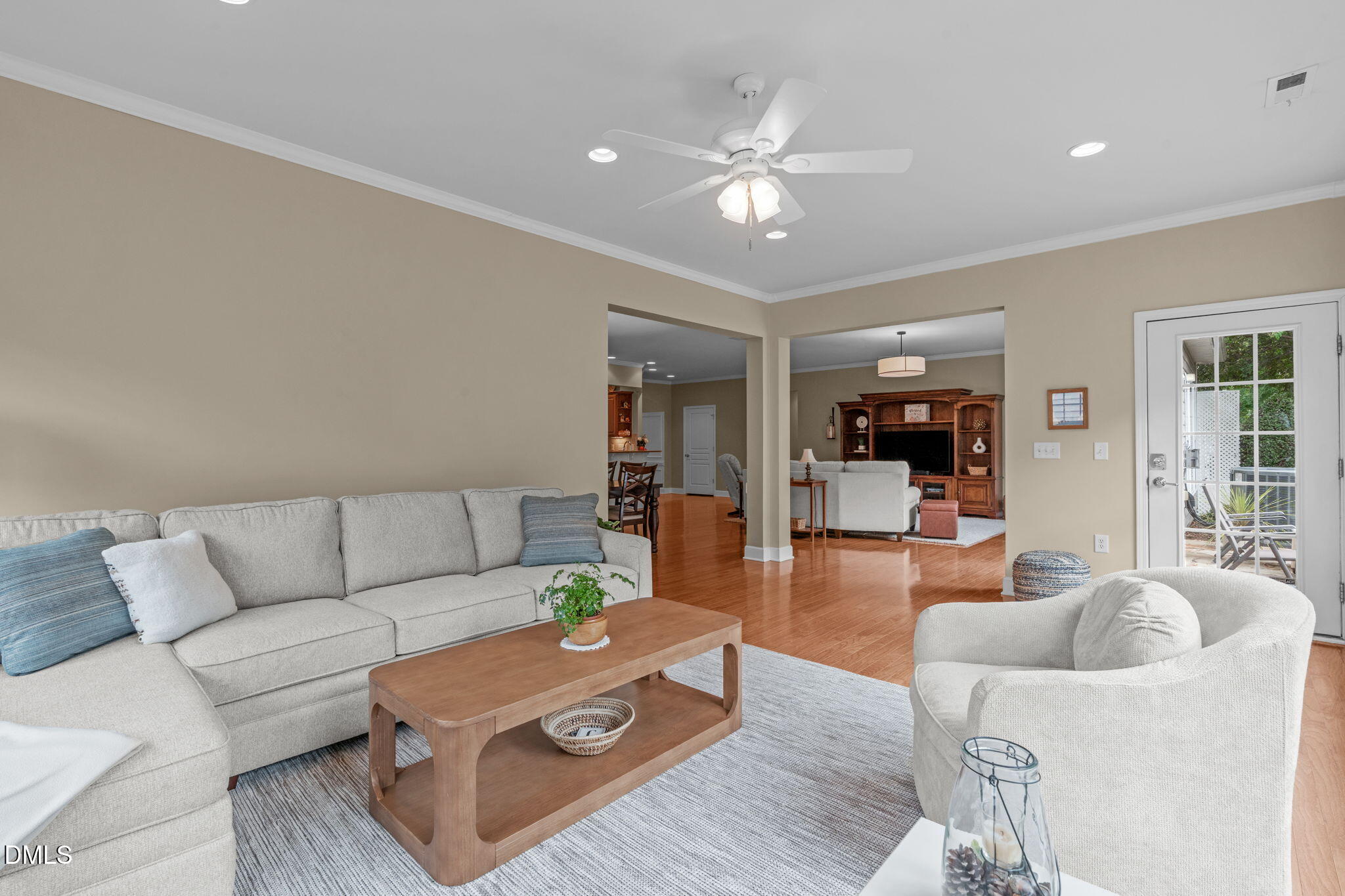 113 Beckingham Loop Cary, NC 27519 - Photo 19 of 57 a living room with furniture and wooden floor