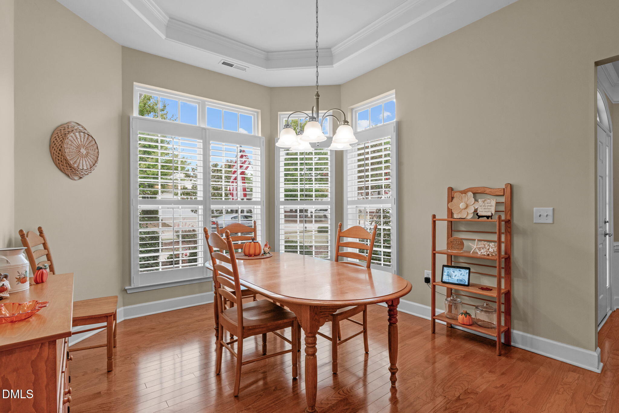 113 Beckingham Loop Cary, NC 27519 - Photo 27 of 57 a view of a dining room with furniture window and wooden floor