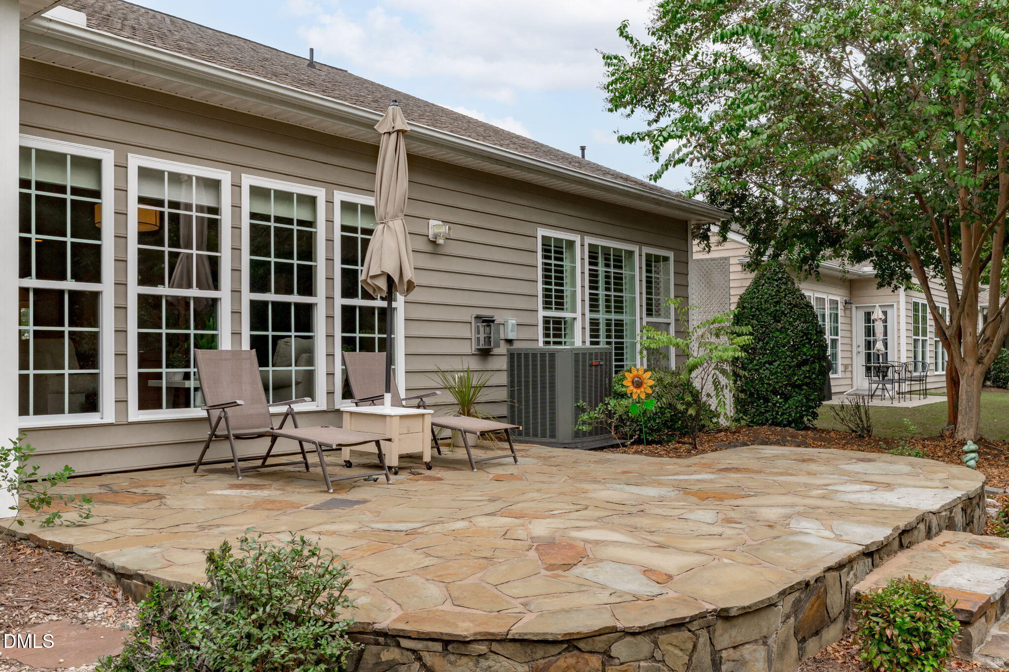 113 Beckingham Loop Cary, NC 27519 - Photo 45 of 57 a view of house with backyard and outdoor seating