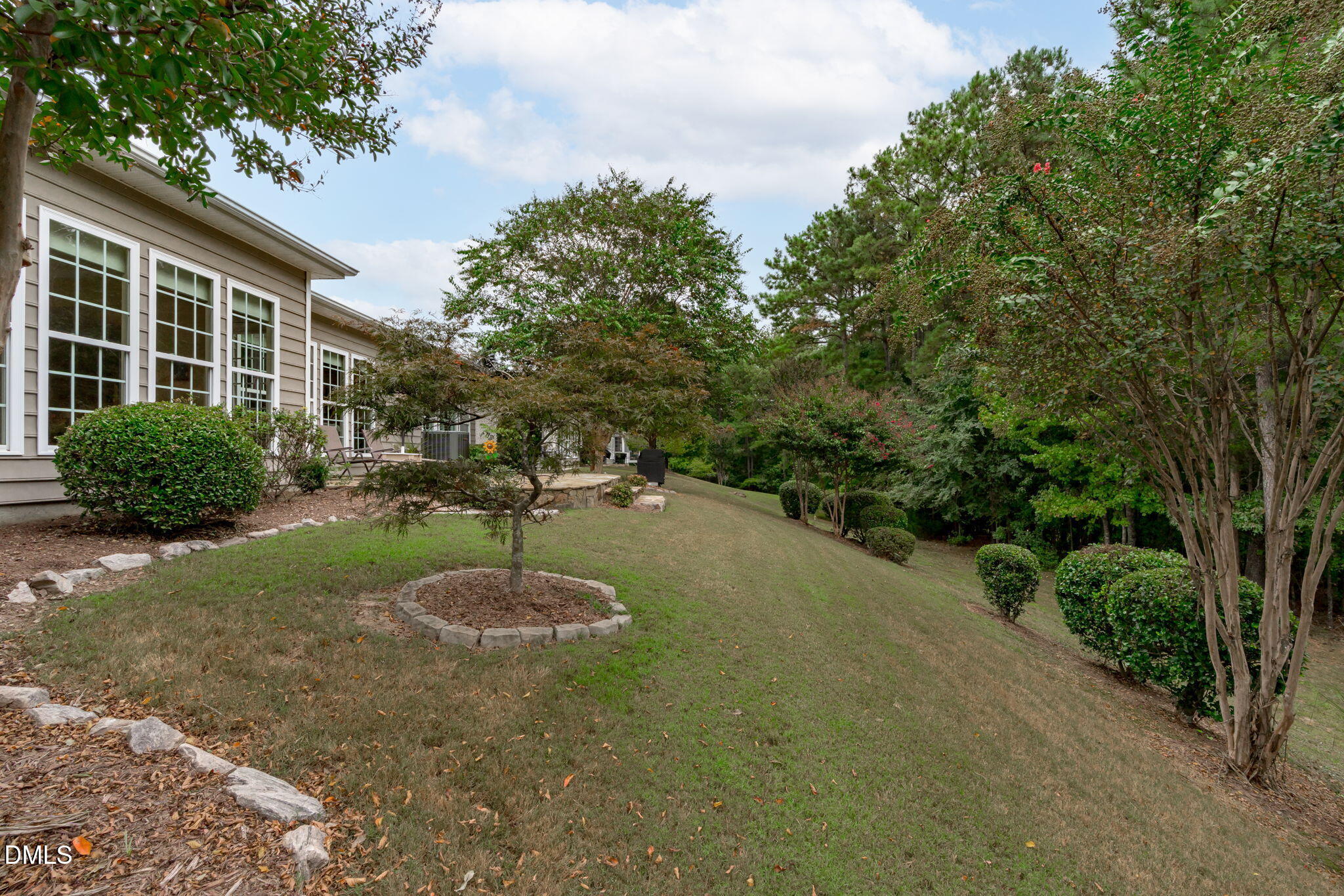 113 Beckingham Loop Cary, NC 27519 - Photo 47 of 57 a swimming pool with outdoor seating and plants