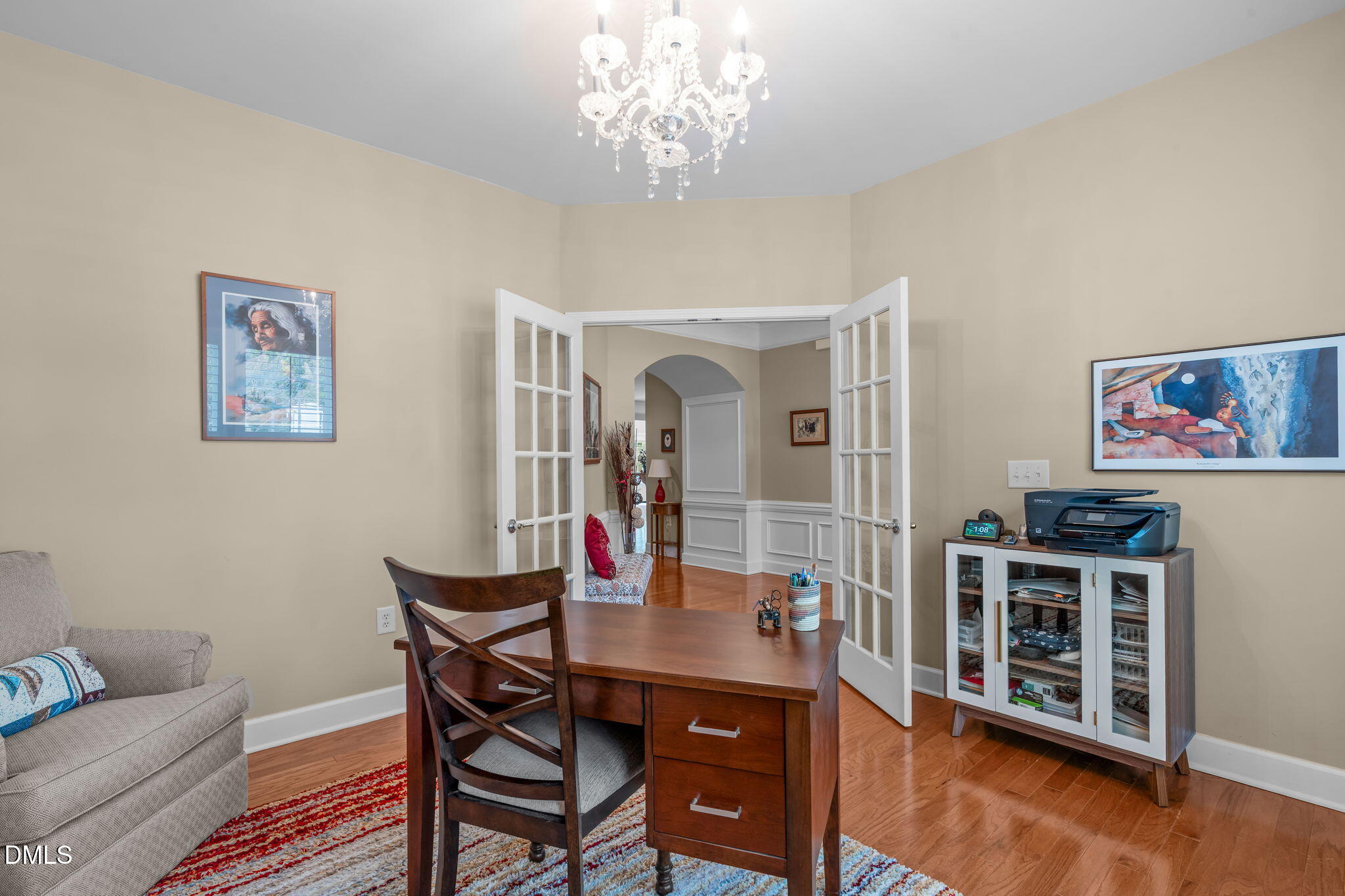 113 Beckingham Loop Cary, NC 27519 - Photo 8 of 57 a view of a dining room with furniture wooden floor and a chandelier