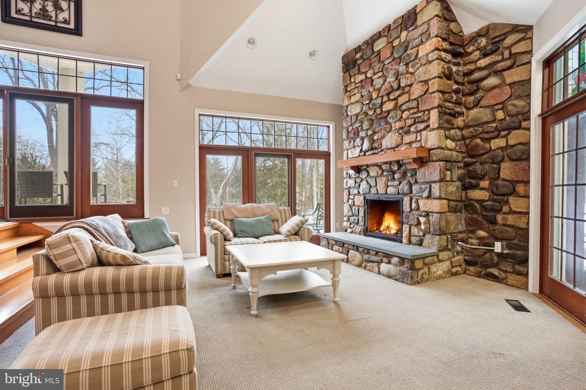244 Mathers Road Ambler, PA 19002 - Photo 27 of 96 Cozy living space with a stone fireplace.