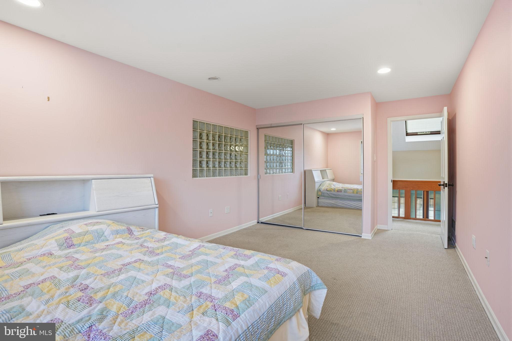 244 Mathers Road Ambler, PA 19002 - Photo 38 of 96 Charming pastel bedroom with mirrored accents.