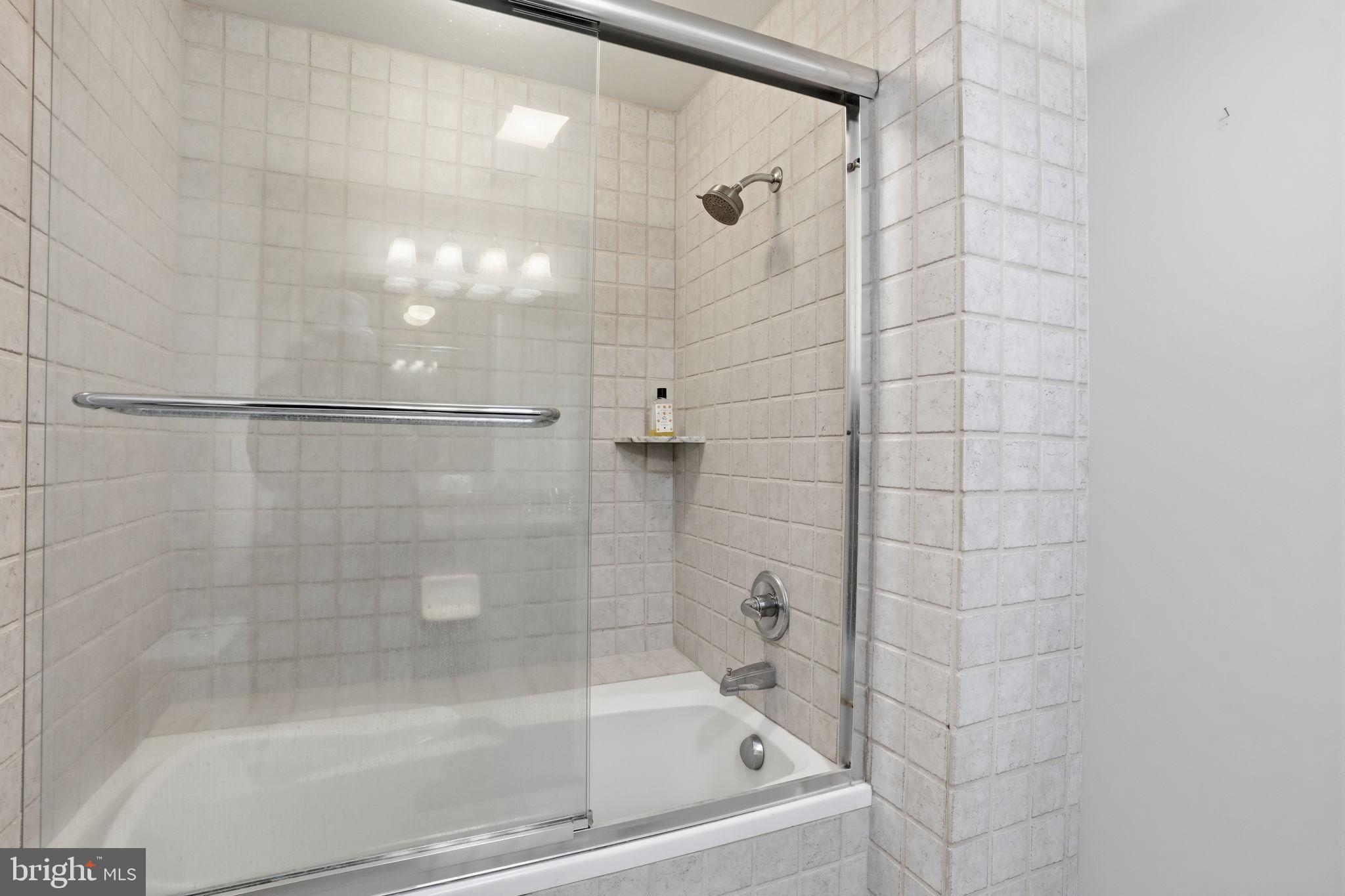 244 Mathers Road Ambler, PA 19002 - Photo 42 of 96 Sleek, modern bathroom with elegant tiles.