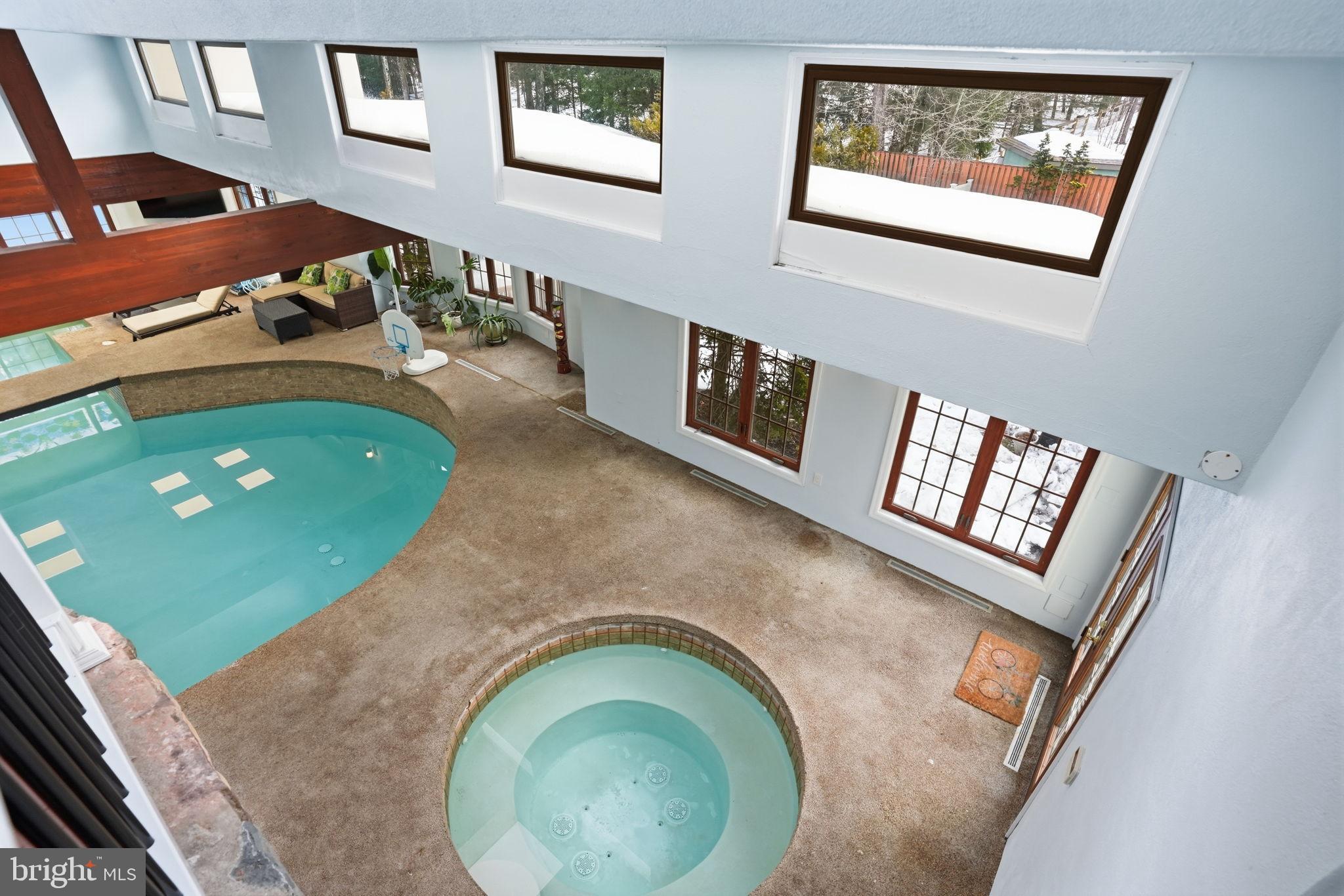244 Mathers Road Ambler, PA 19002 - Photo 56 of 96 Luxurious indoor pool oasis with natural light.