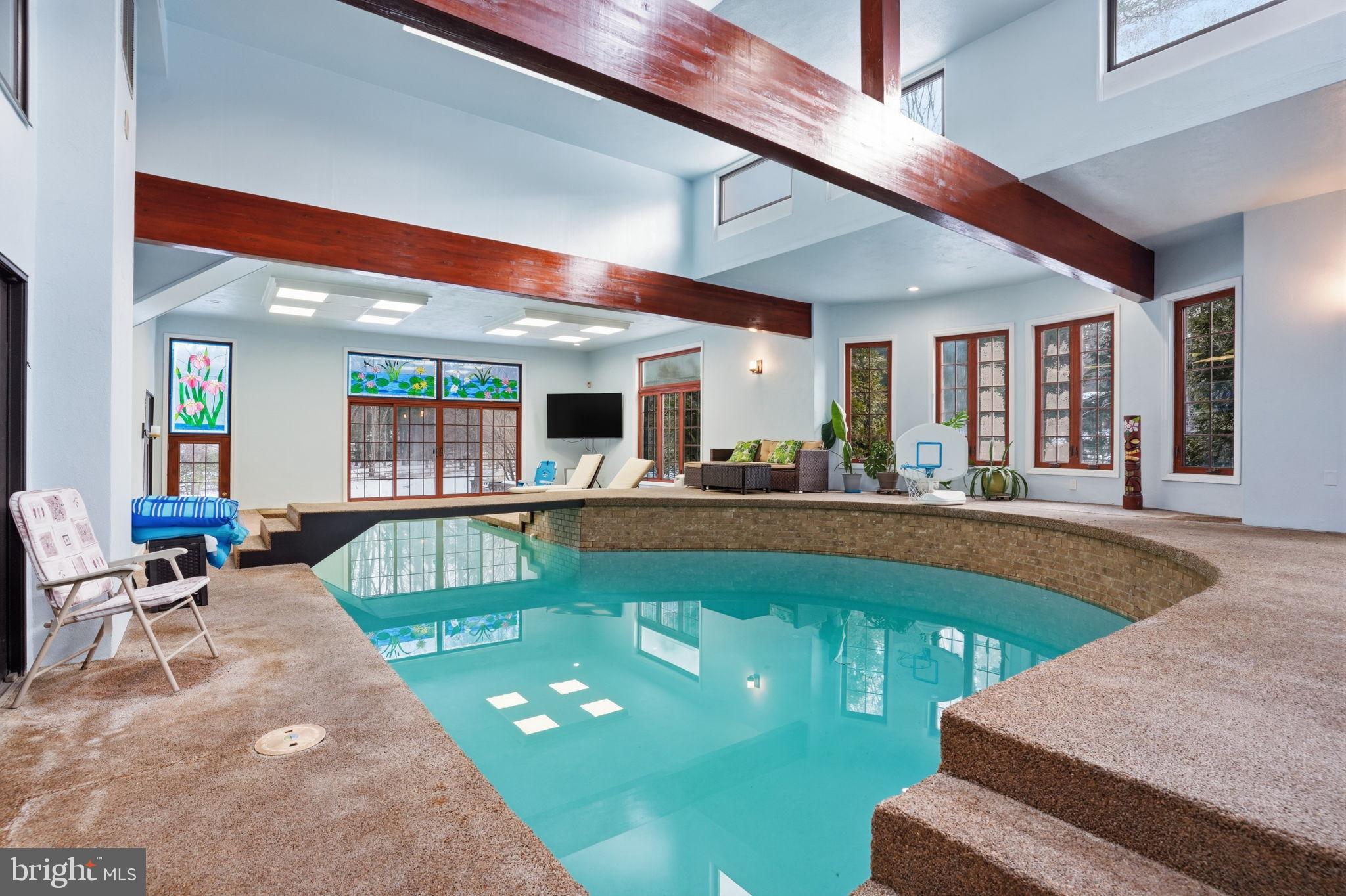 244 Mathers Road Ambler, PA 19002 - Photo 65 of 96 Luxurious indoor pool with stunning design.