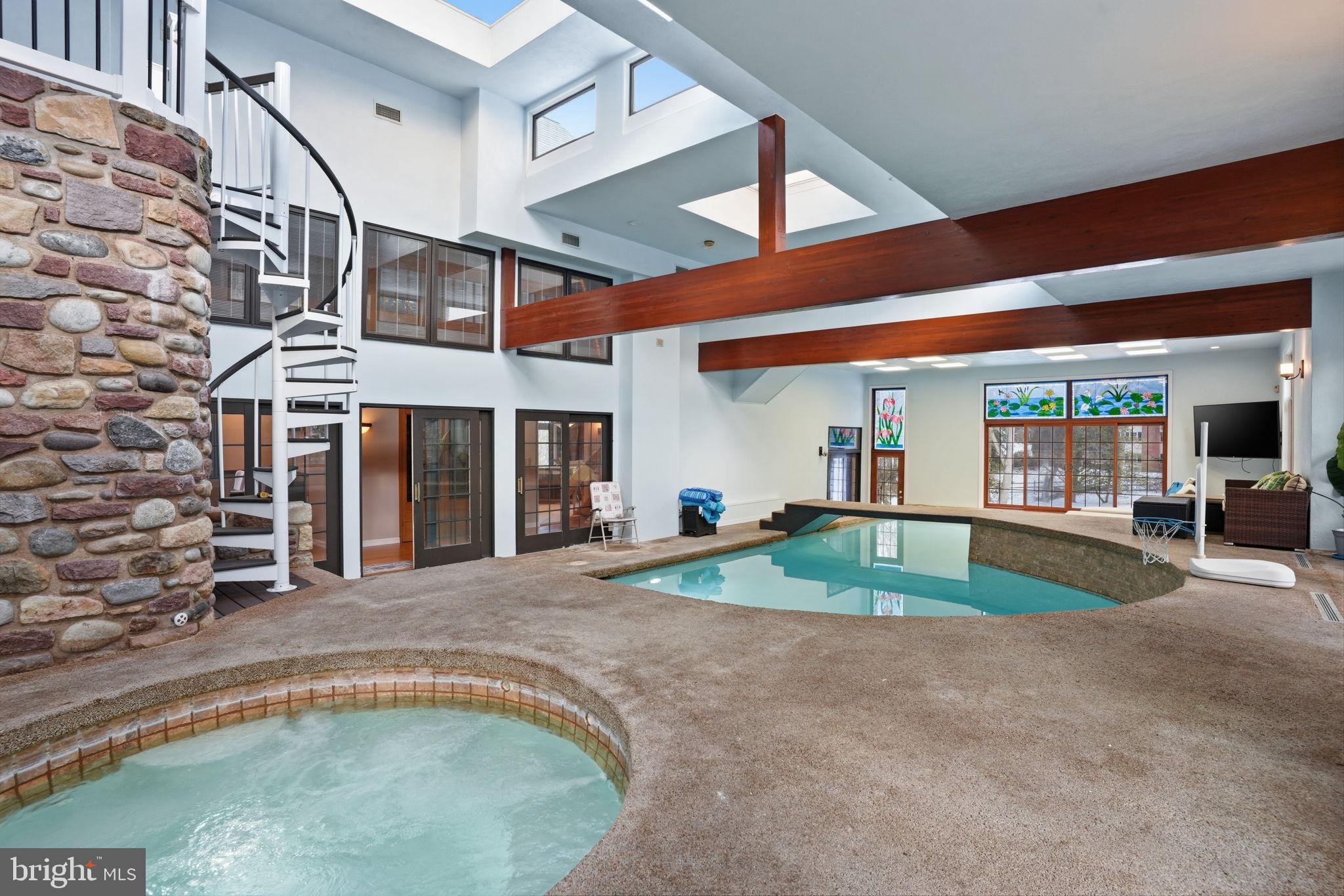 244 Mathers Road Ambler, PA 19002 - Photo 66 of 96 Luxurious indoor pool with spiral staircase.