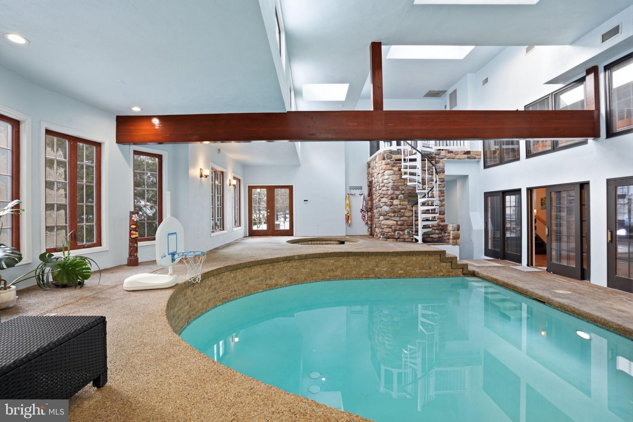 244 Mathers Road Ambler, PA 19002 - Photo 69 of 96 Indoor oasis with a stunning pool feature.