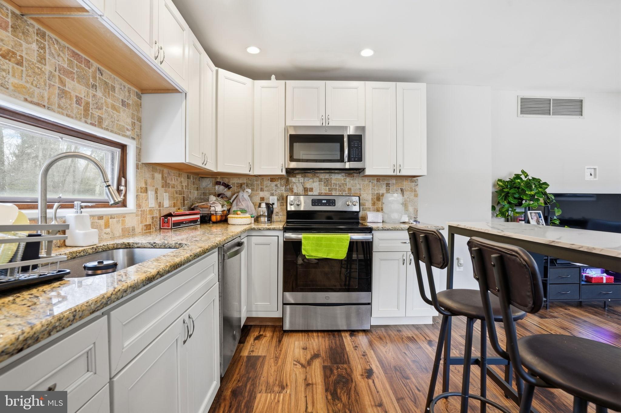 244 Mathers Road Ambler, PA 19002 - Photo 77 of 96 Modern kitchen with sleek finishes.