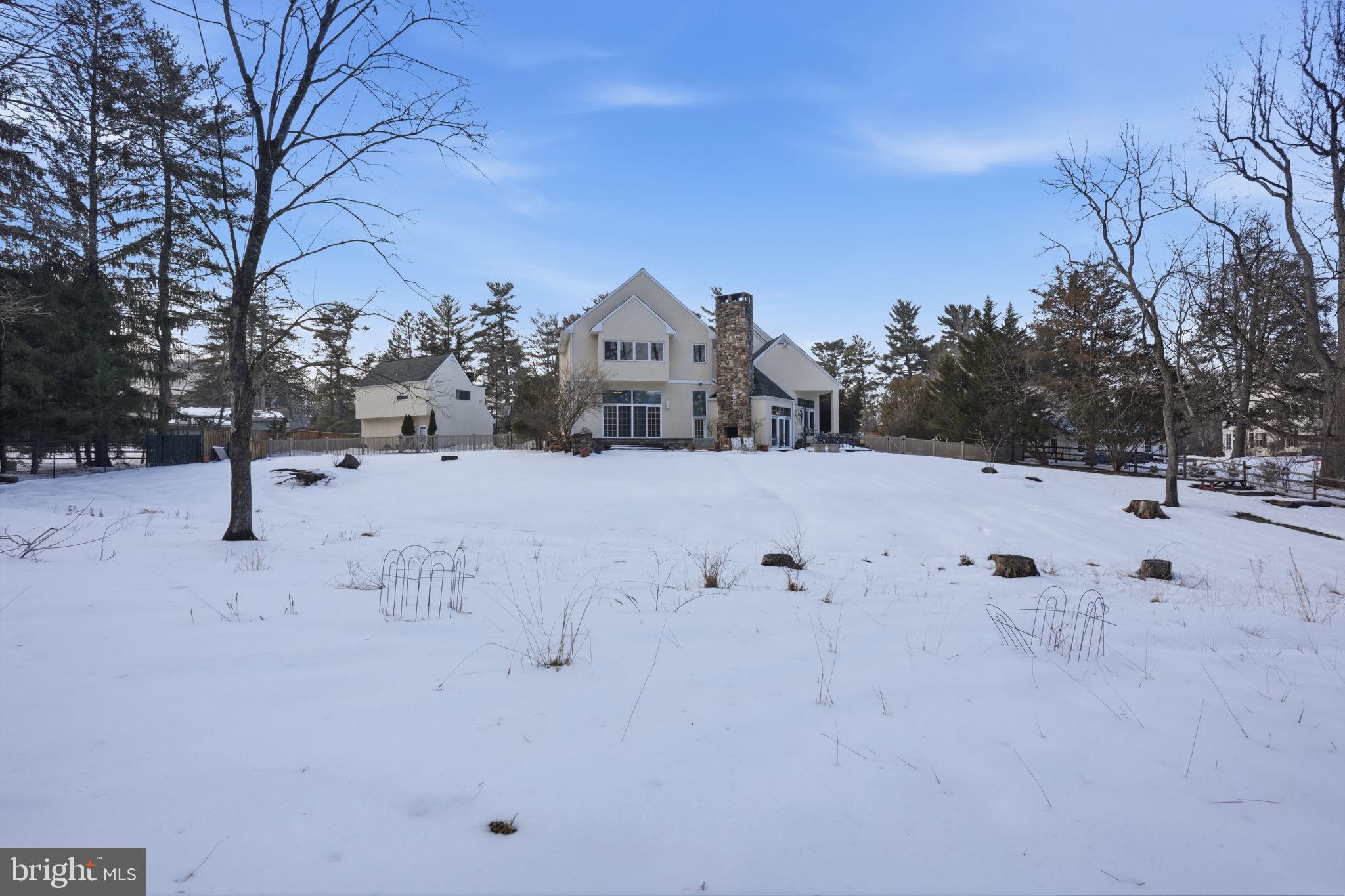 244 Mathers Road Ambler, PA 19002 - Photo 79 of 96 Serene winter retreat amidst snowy landscape.