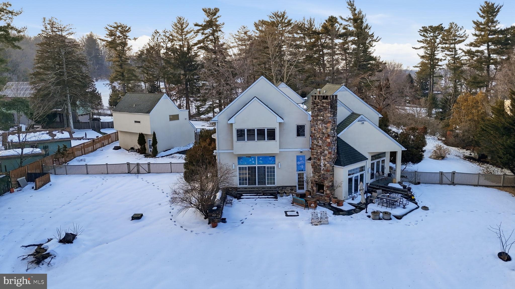 244 Mathers Road Ambler, PA 19002 - Photo 95 of 96 Charming home nestled in a snowy landscape.