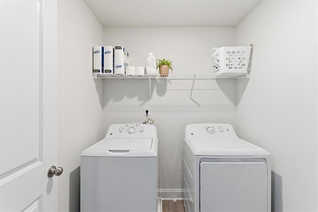 176 Village Way Southwest Calhoun, GA 30701 - Photo 38 of 53 a utility room with dryer and washer
