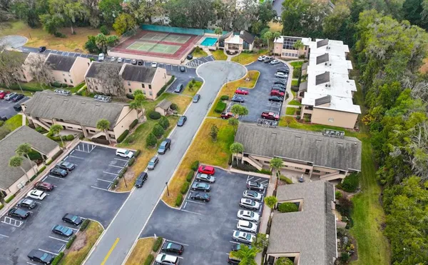 a aerial view of a house with swimming pool and outdoor space